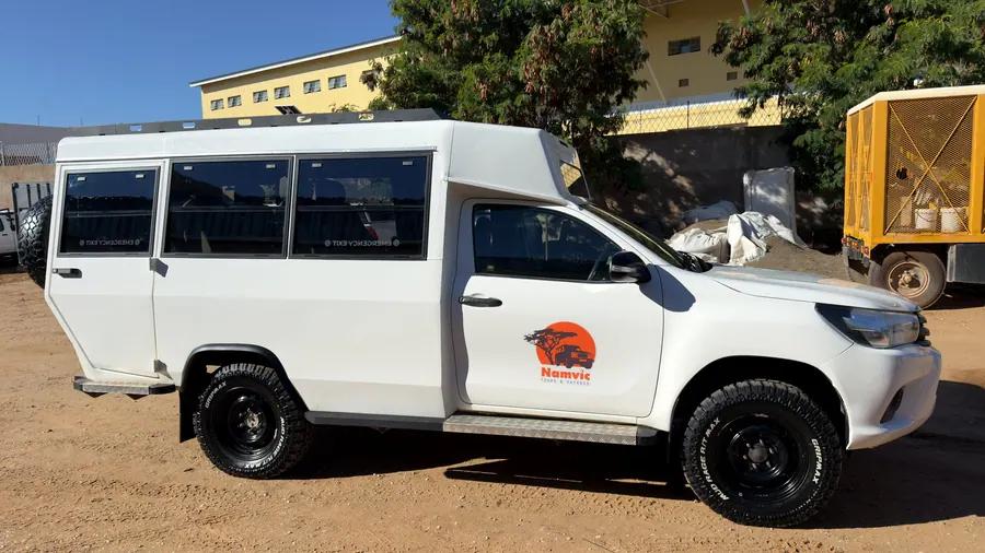 Safari vehicle profile - Practical group safari transport for lodge, camping and mixed Namibia routes.