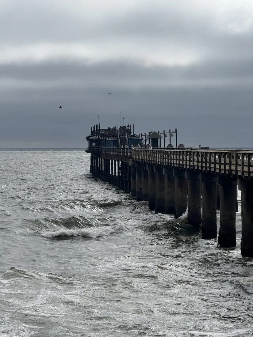 Swakopmund jetty across silver Atlantic water