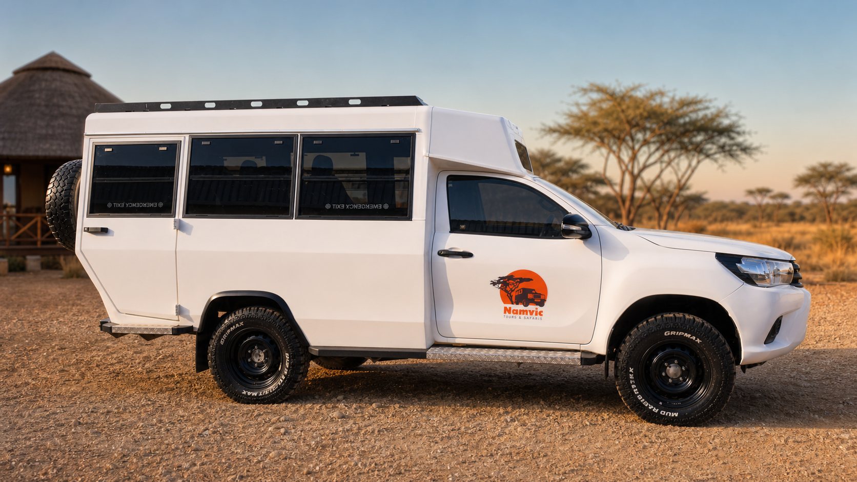 Toyota Hilux 10-seater safari vehicle for guided Namvic tours